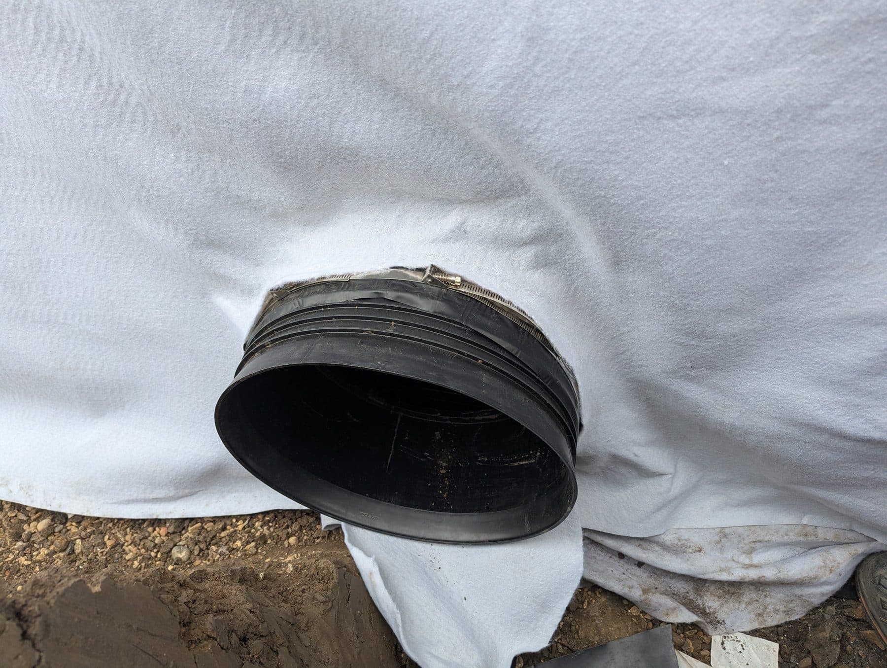 Pipe boot sealed through the fleece