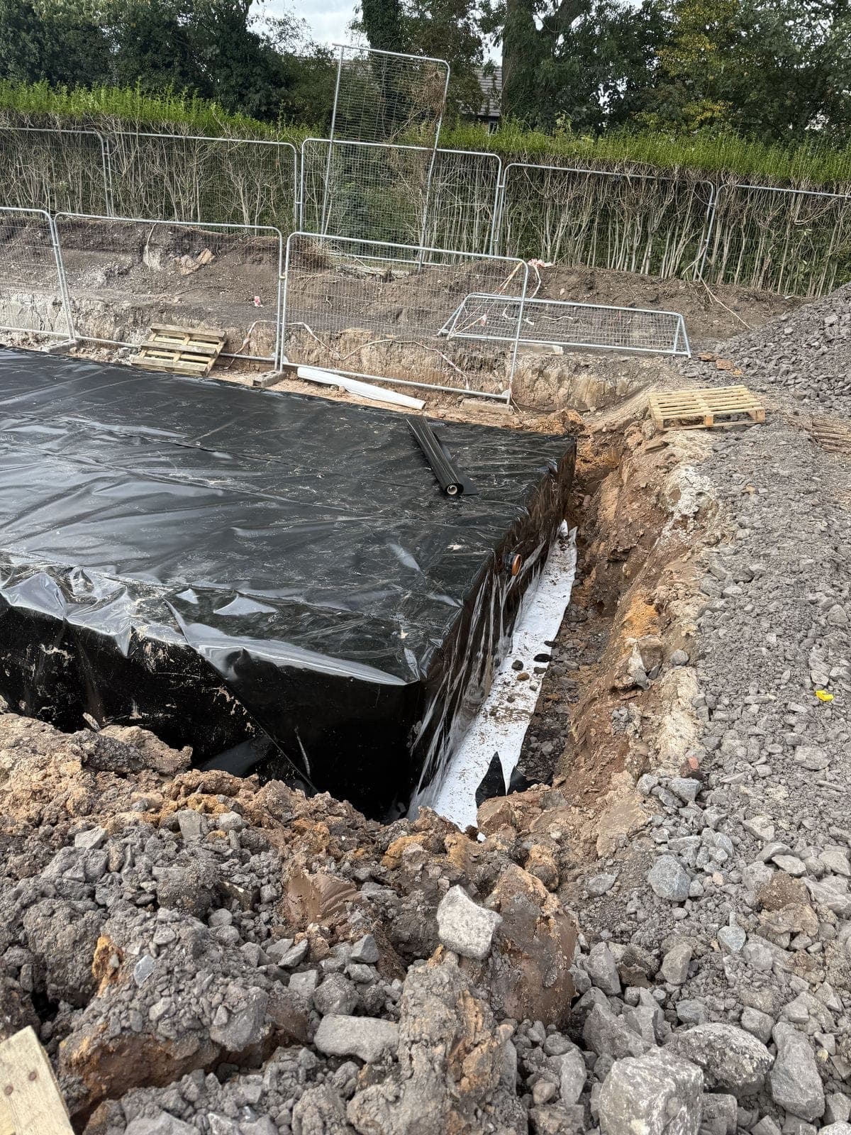 Welded membrane dressed down the side of the Whittingham tank